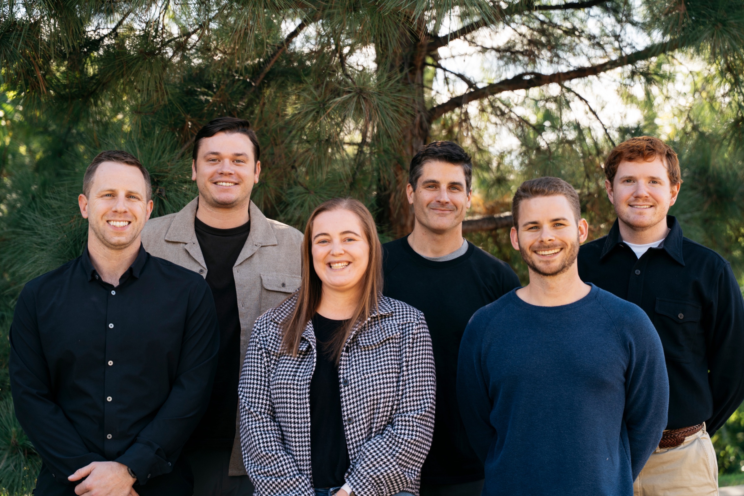 The Canvas Retail team together outdoors